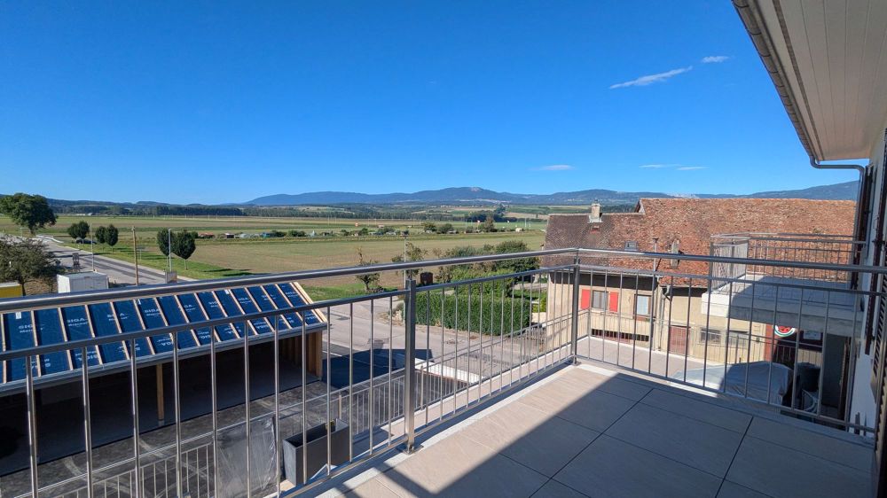 Neue 2,5-Zimmer-Wohnung mit Balkon und Panoramablick in Chavornay - Bild 1