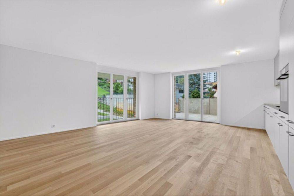 Moderne Familienwohnung mit grosszügigem Gartensitzplatz - Bild 7