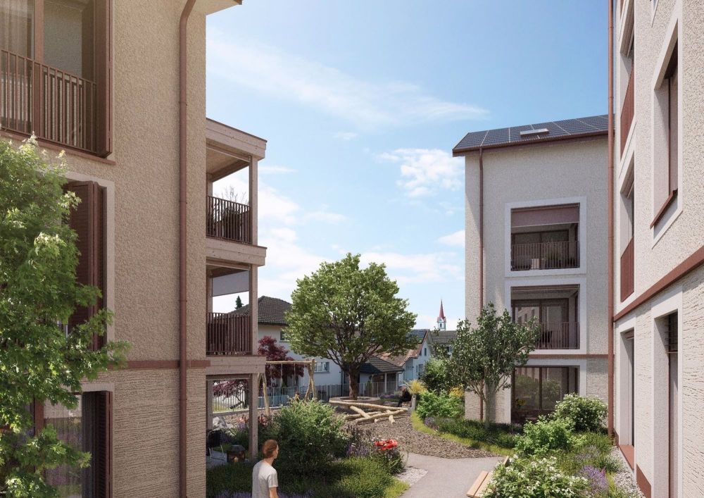 Hochmoderne Neubauwohnung in Pfaffnau - Innenhof