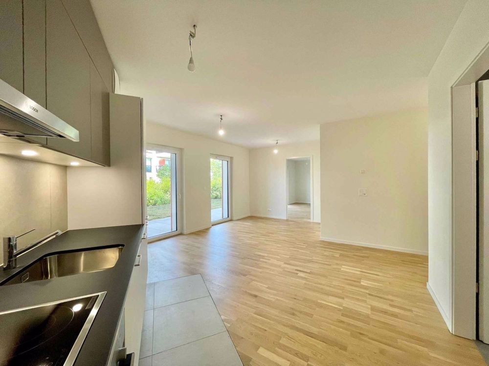 Charmanter Neubau-2.5-Zimmer-Wohnung mit Terrasse und Garten - Bild 1