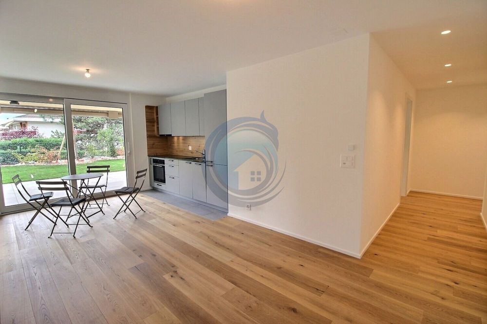 PRÄCHTIGES NEUES 2,5-ZIMMER-WOHNUNG MIT TERRASSE UND GARTEN - Bild 1