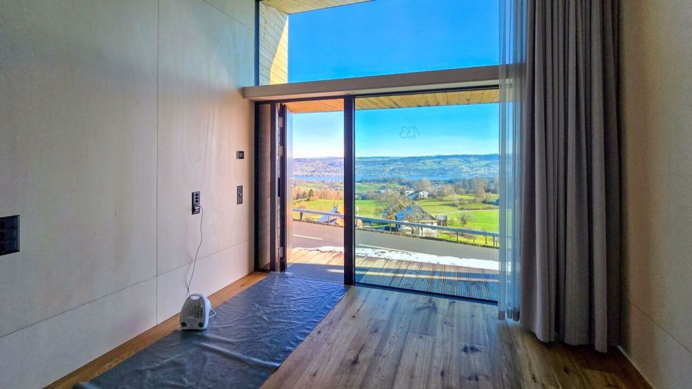 2.5 Zi-Tiny House mit unverbaubarem Weitblick - Wohnbereich mit atemberaubender Aussicht