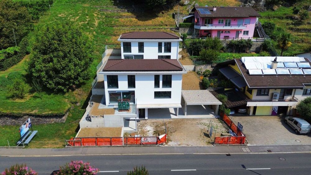 2 neue moderne 4 ½ und 5 ½ Zimmer Häuser mit allem Komfort | 2 nuove case moderne di 4½ e 5½ locali con ogni comfort - dji_fly_20240805_115158_917_1722860228442_photo_optimized (1).jpg