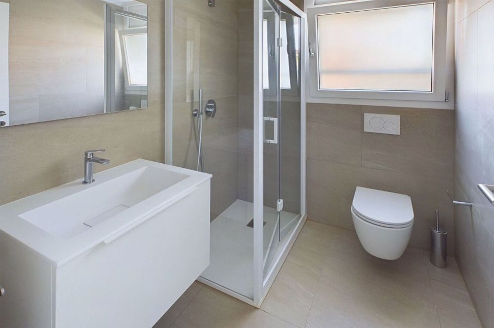 Moderno appartamento a reddito di 3½ locali in ottima posizione - Bild 8
