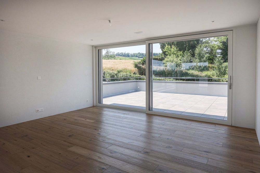 Erstbezug: grosse Attikawohnung im Eigentumsstandard mit exklusivem Ausbau - Wohnzimmer