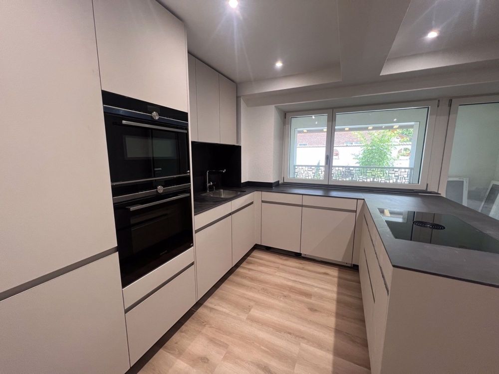 Exklusive Neubauwohnung mit stilvoller Designküche und unvergleichlichem Charme mitten in Arisdorf - Bild 9