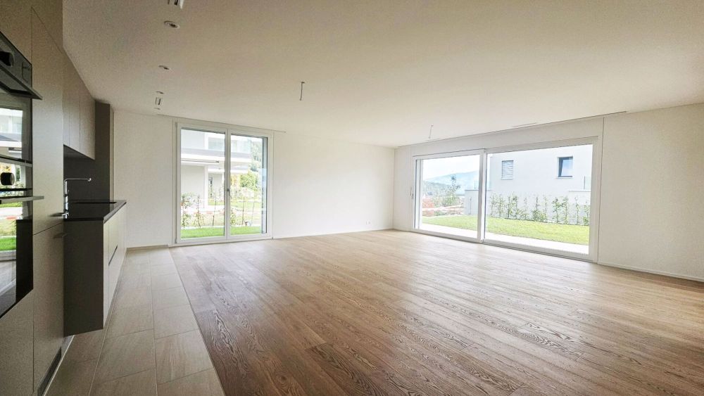 Gartenwohnung mit grossem Gartensitzplatz in ruhigem Wohnquartier - Bild 1