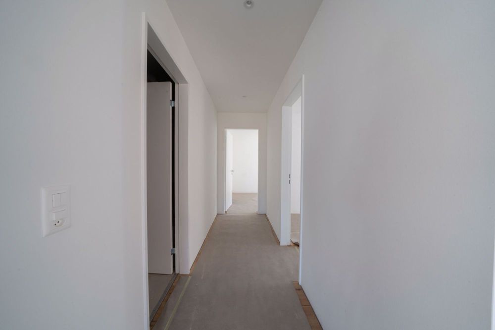 Erstbezug 3.5-Zimmer-Gartenwohnung mit ca. 138 m2 Rasenfläche - Bild 4