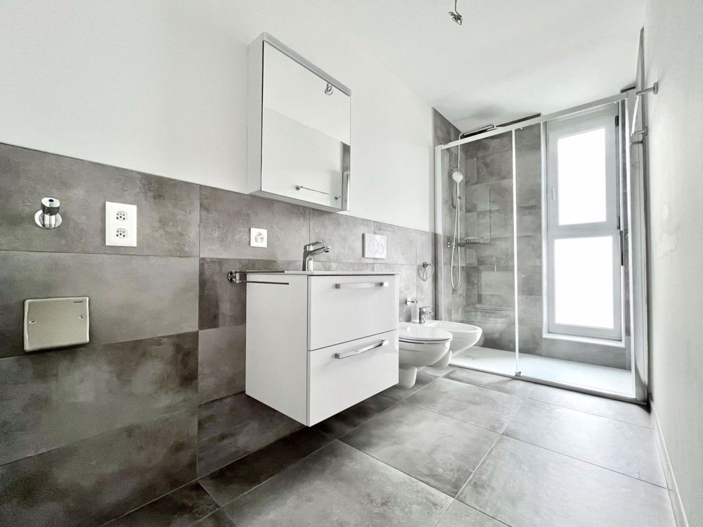 Zu vermieten 2.5-Zimmer-Wohnung im Erdgeschoss mit Terrasse in Lugano Tesserete - Bild 7
