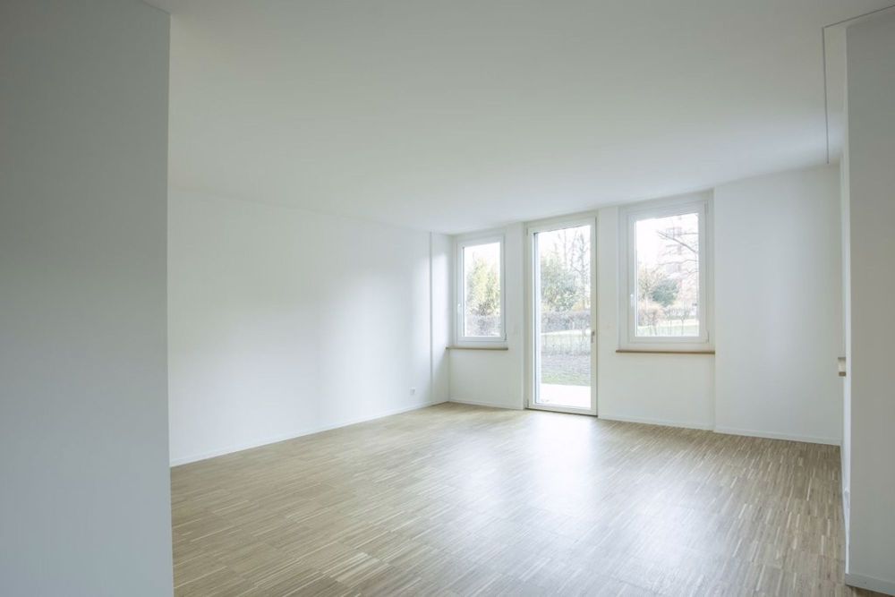 ERSTVERMIETUNG - 3.5-Zi.-Wohnung mit Terrasse und Waschturm - Wohnzimmer.jpg