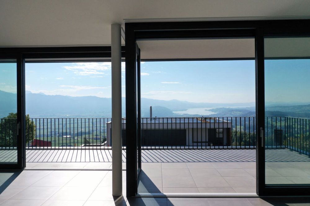 Terrassenwohnung an Top Panorama Lage mit unverbaubarer Berg- und Seesicht - Bild 1