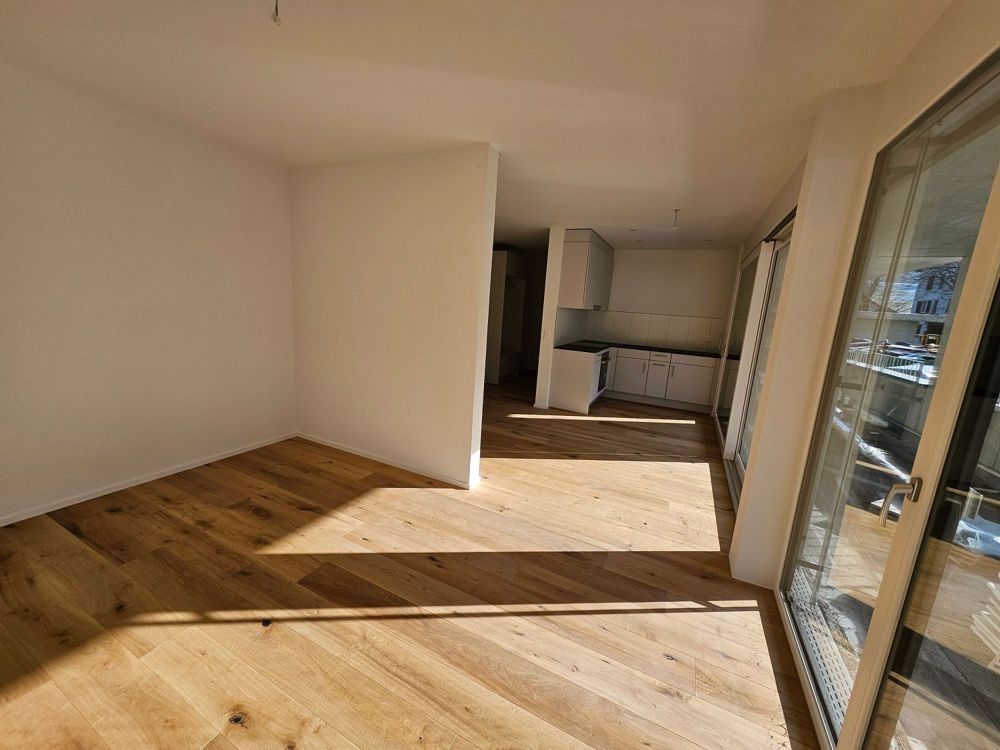 2.5 Zi Neubau WG mit offenem Grundriss und grossem Balkon - Bild 1