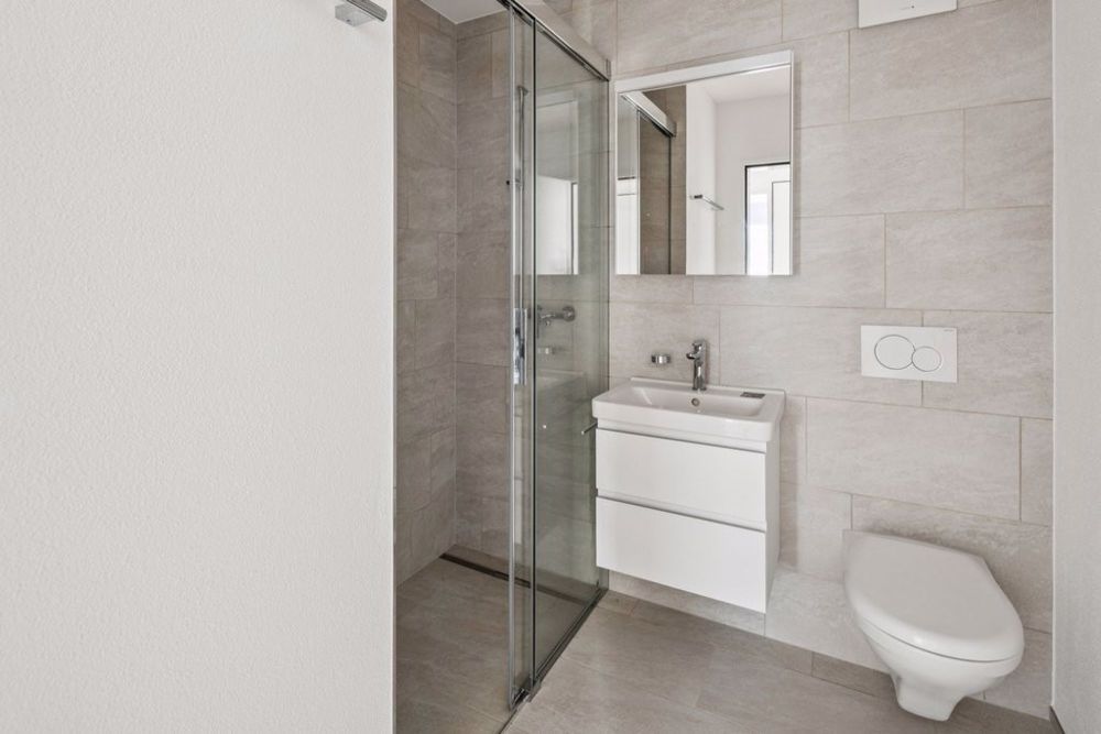 HOCHWERTIGES WOHNEN IM GRÜNEN - NEUBAUPROJEKT EICHHOLZ - Nasszelle mit Dusche