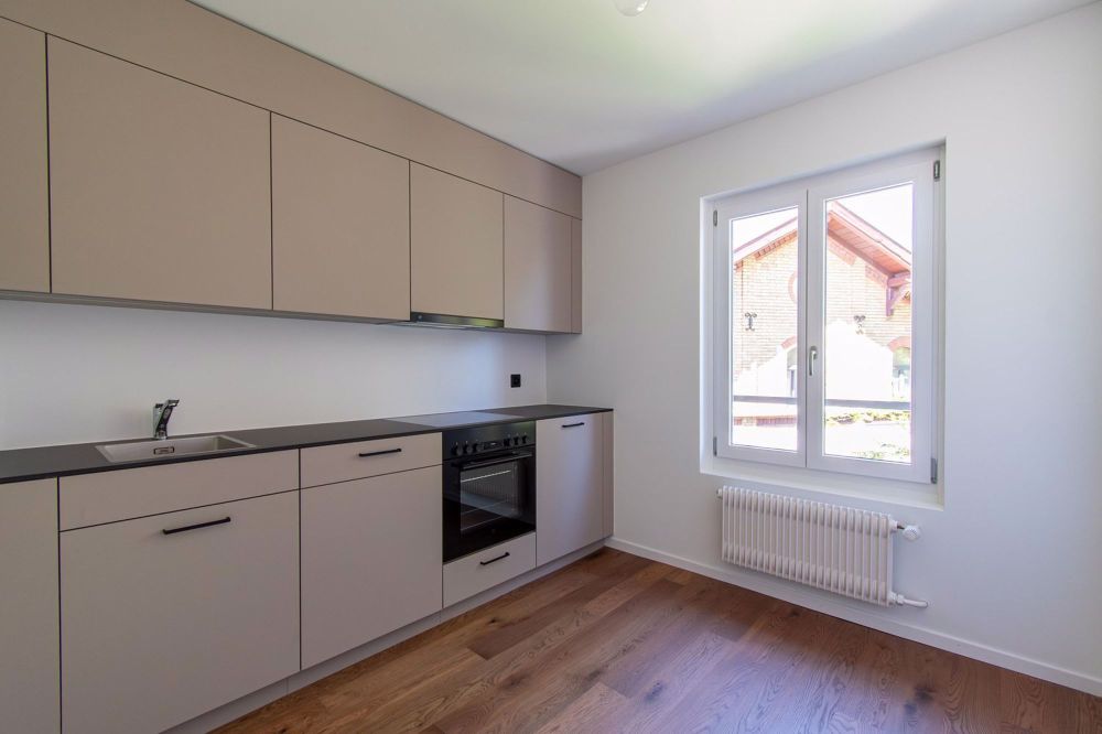 Erstvermietung hochwertige 1.5 Zimmer-Wohnung im Hochparterre - Bild 1