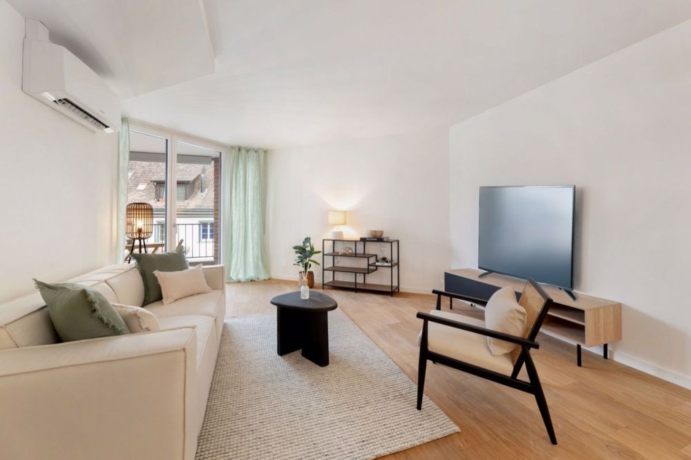 Klimatisierte 2.5 Zimmerwohnungen mit Concierge, Fitness und Pool - Wohnzimmer