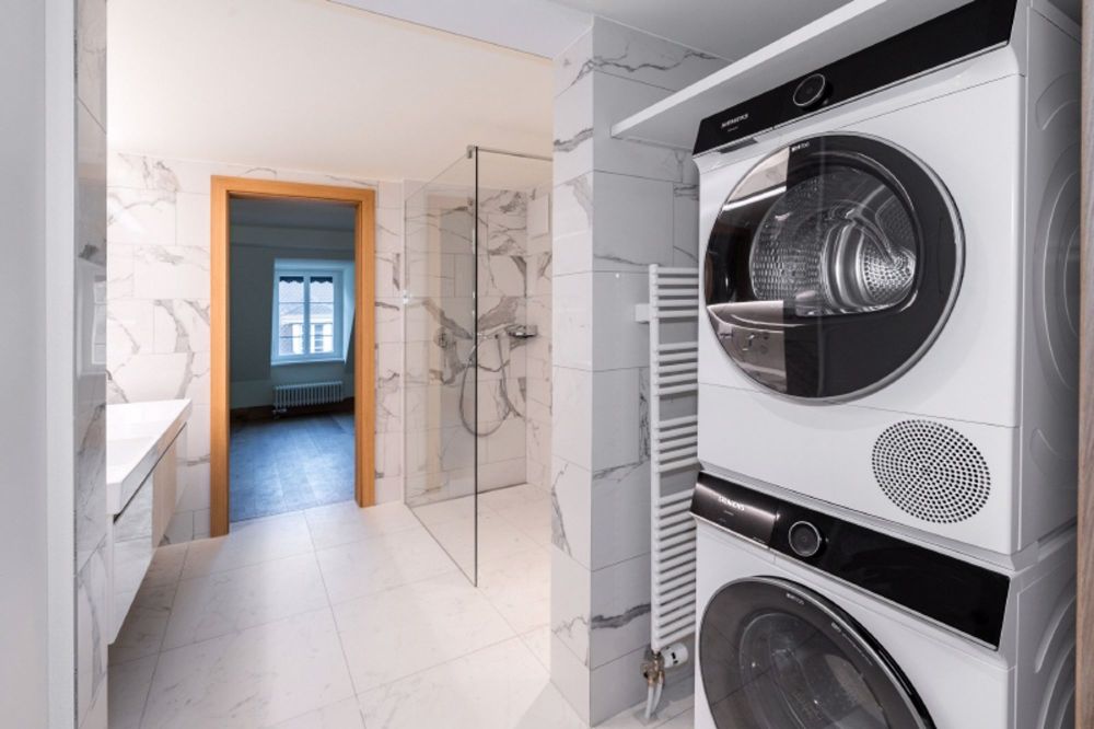 ERSTVERMIETUNG: Exklusive Attikawohnung mit 76 m² eigener Dachterrasse und 360° Panoramablick - Waschturm