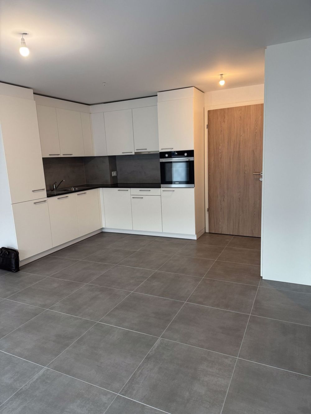 Magnifique 2.5 pièces neuf avec grande terrasse et garage souterrain - Bild 2