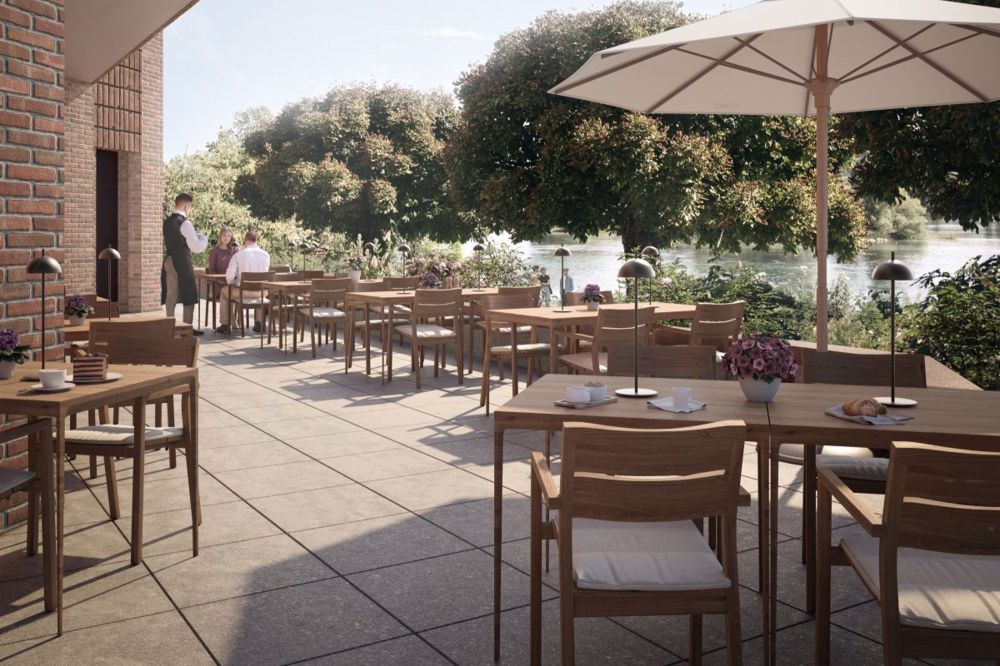 Klimatisierte 2.5 Zimmerwohnungen mit Concierge, Fitness und Pool - Restaurant Terrasse.jpg