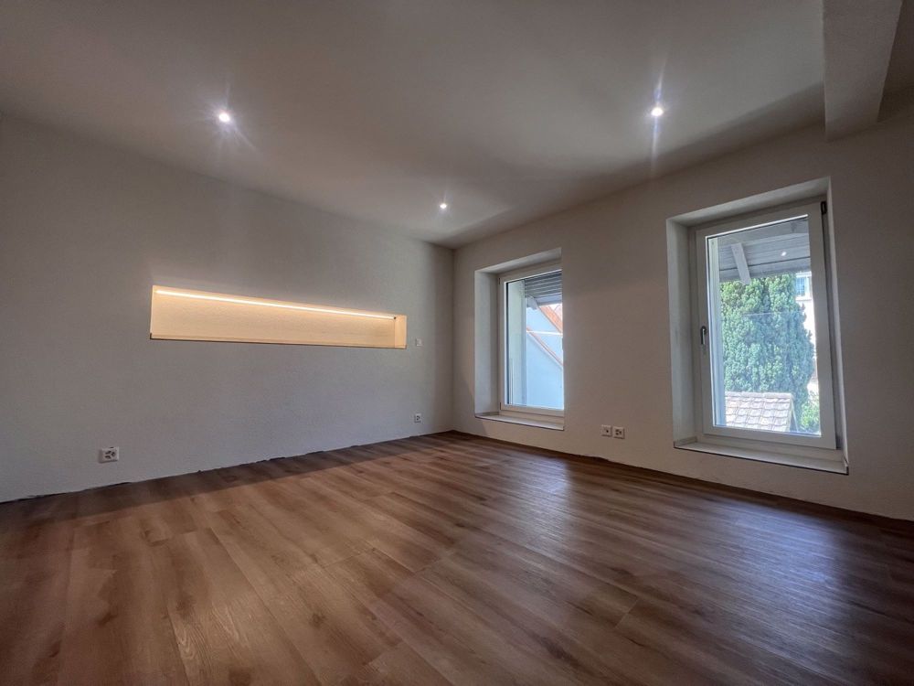 Exklusive Neubauwohnung mit stilvoller Designküche und unvergleichlichem Charme mitten in Arisdorf - Bild 6