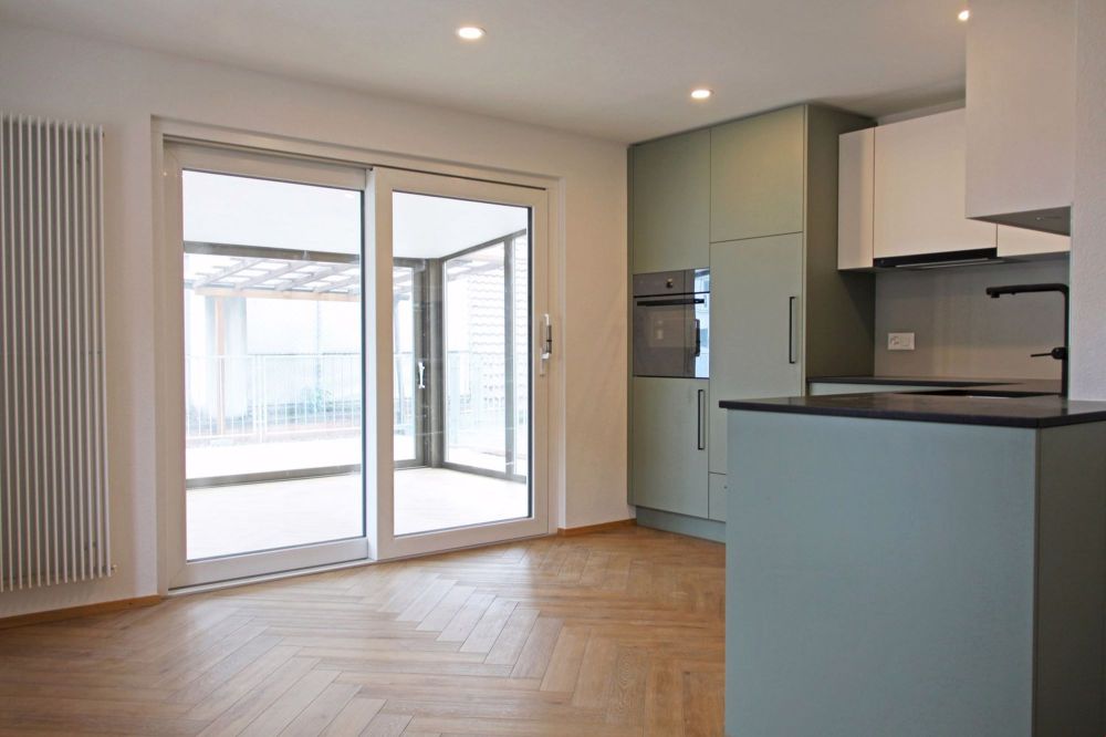 Zentrale Wohnung mit Wintergarten in Langnau - Bild 1