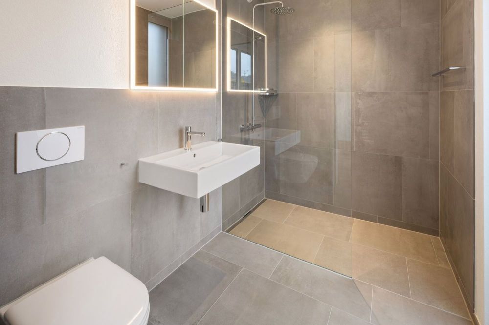 Neubau am Bächli - 4.5-Zimmerwohnungen für die ganze Familie - Badezimmer mit Dusche