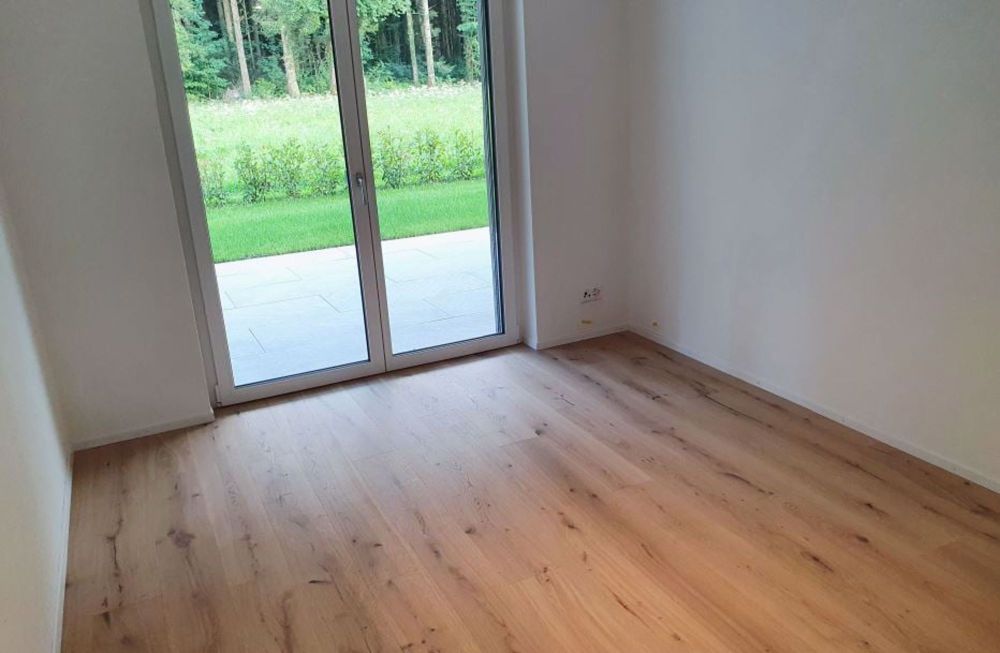 moderne 3.5-Zimmerwohnung mit Sitzplatz - Zimmer