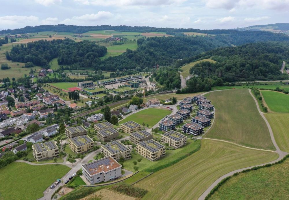 Zuhause sein beginnt hier - wohnen im Aemet Birmensdorf - 300-Cam06-Vogelpersp-Ost.jpg
