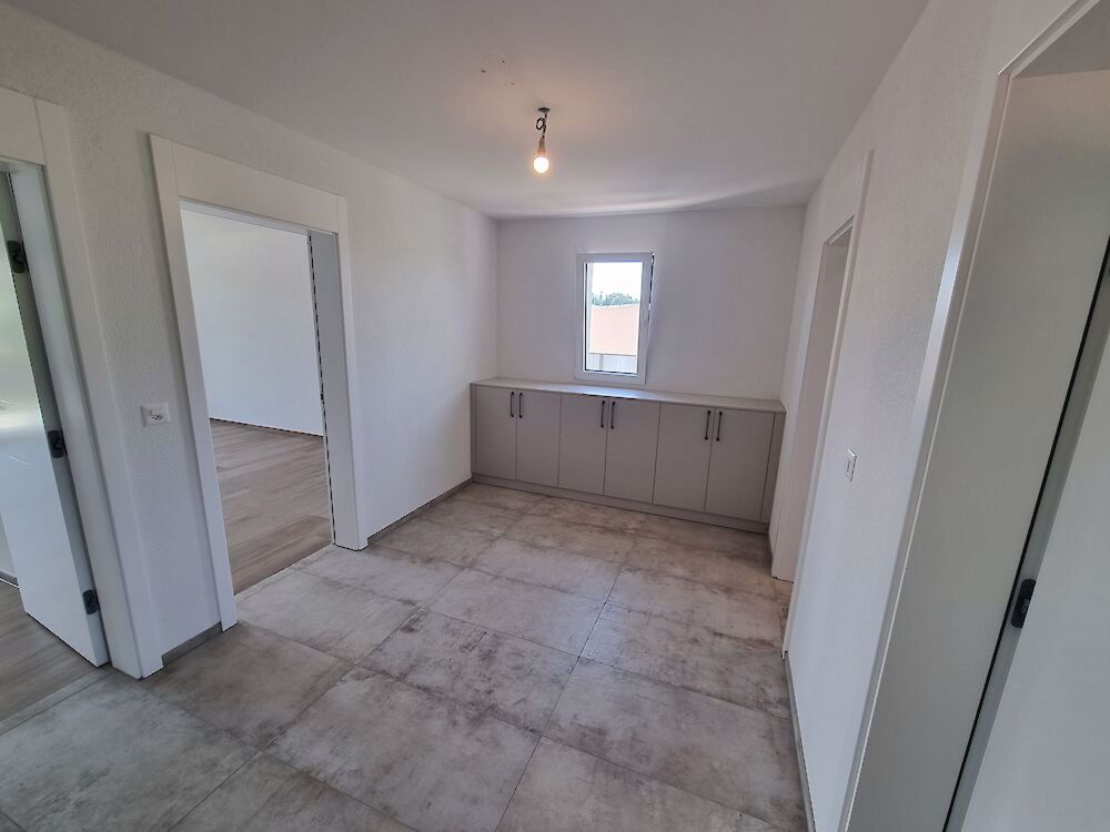 Modernes Reihenhaus in grüner Umgebung - Bild 11