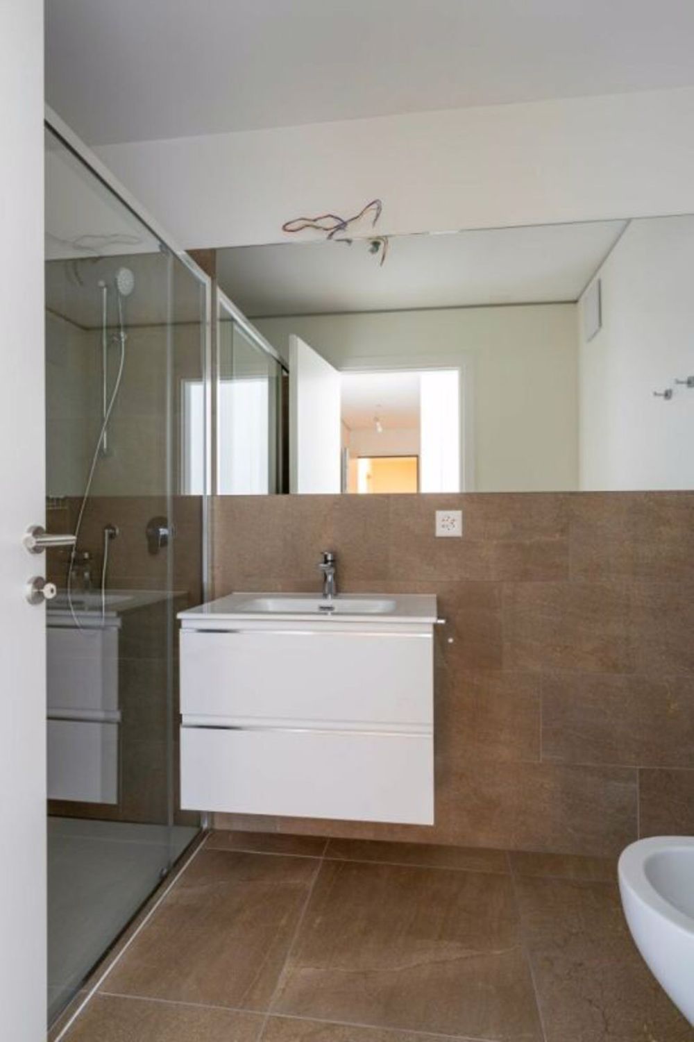 Appartement zur Miete in der Residenza Querciabella in Bioggio mit Seeblick - Bild 9