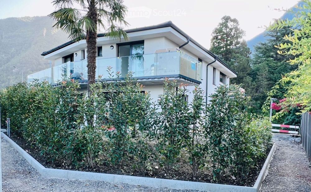 Moderne 5,5-Zimmer-Bifamilienhaus in Villeneuve mit Seeblick und Bergblick - Bild 1