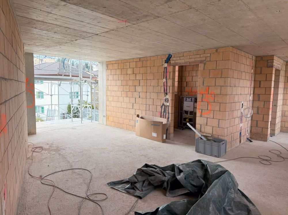 Attraktive 3 1/2 Zimmer Neubau Attika Maisonette an zentraler Lage - OG Wohnraum