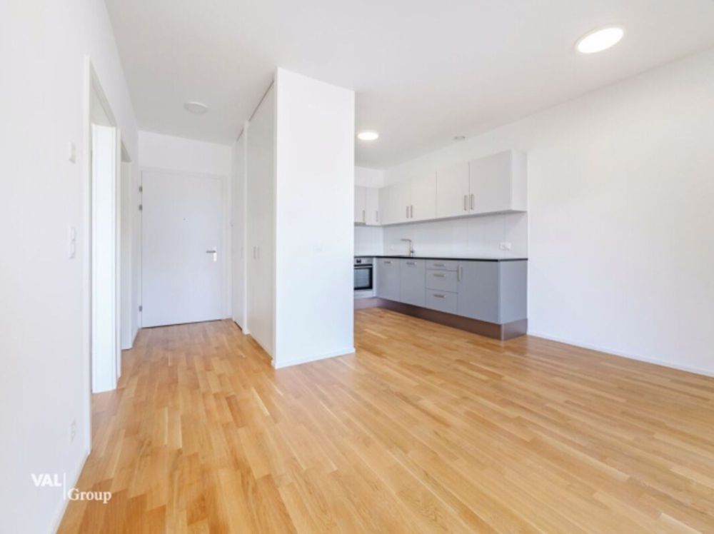 Charmant petit appartement avec place de parc souterraine - Bild 2