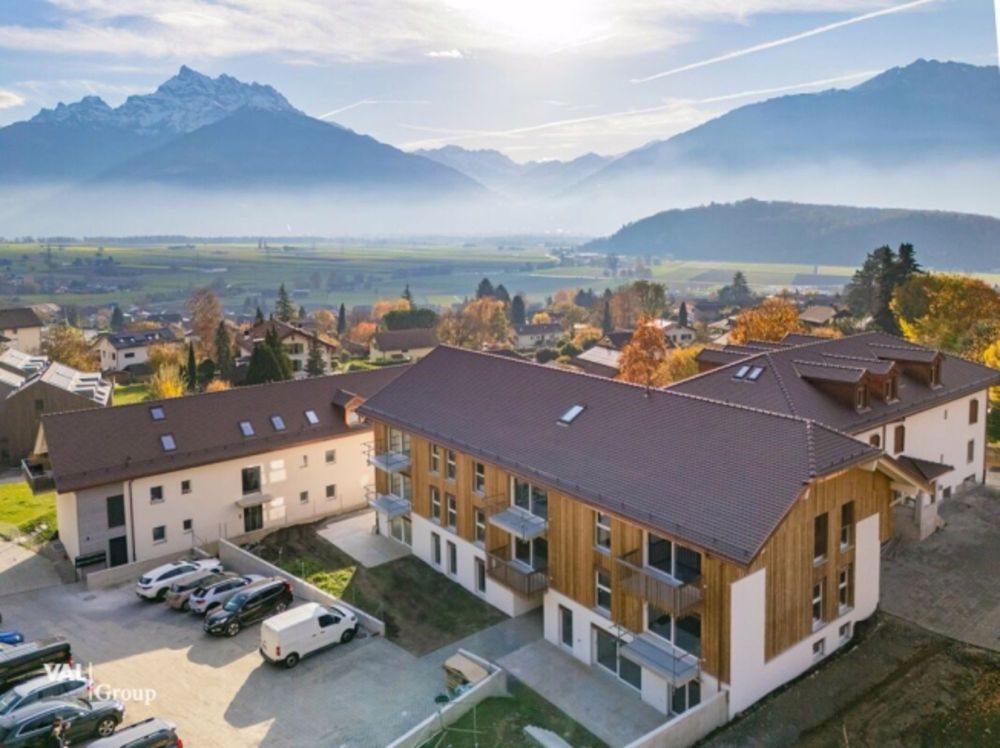 Superbe appartement neuf avec balcon au coeur du village - Bild 1