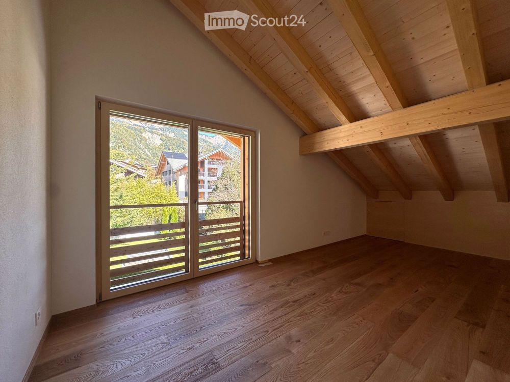 Exklusive Maisonette im Erstbezug – modernes Holzchalet mit Seepanorama und Loft-Charakter (OST) - Bild 13