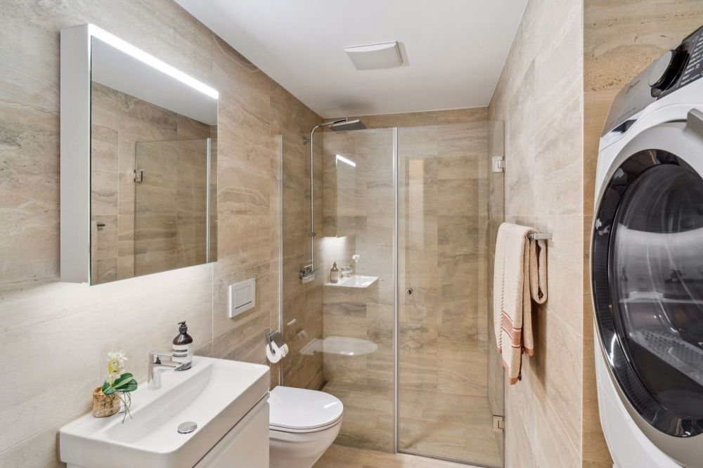 Attraktiv, Exklusiv und Urban - Ihre neue Mietwohnung im Herzen der Stadt - Dusche/WC mit Waschturm
