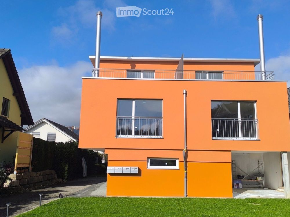 Erstvermietung: Duplex Wohnung mit Kaminofen in DEFH - Bild 1