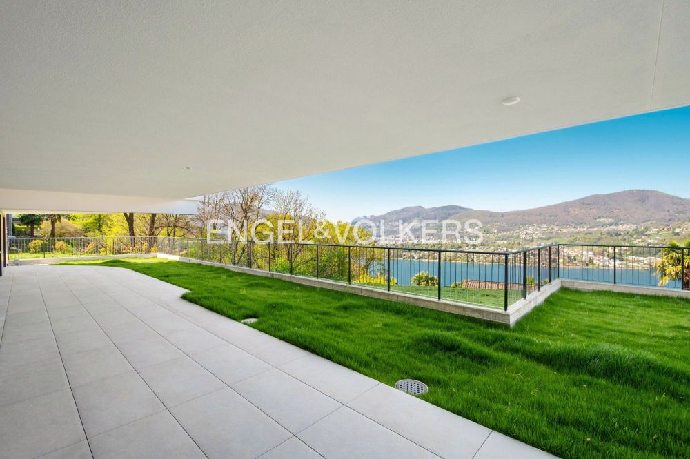 Appartamento di nuova costruzione con giardino e vista lago (Q) - Bild 1