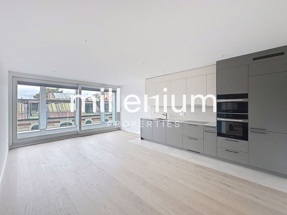 Neue Wohnung mit Springbrunnenblick in Eaux Vives - Bild 1