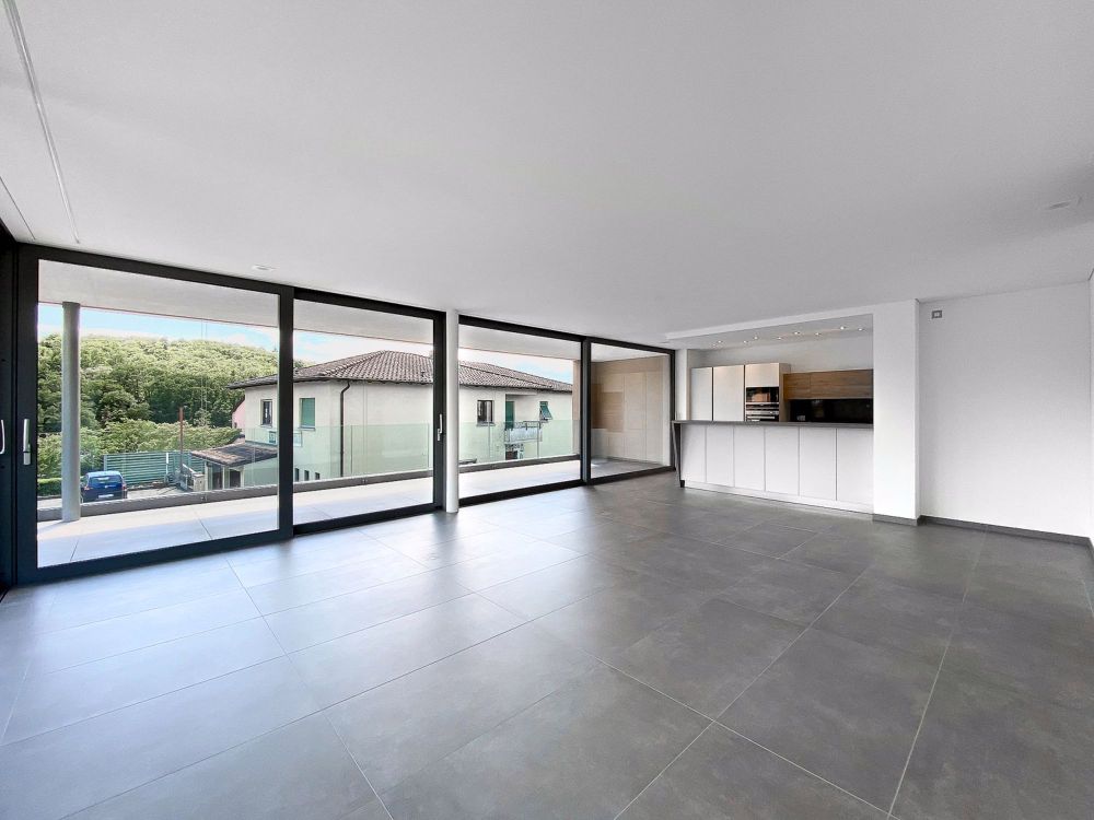 Moderne 3.5 Zimmer in erster Lage in Comano - Bild 1