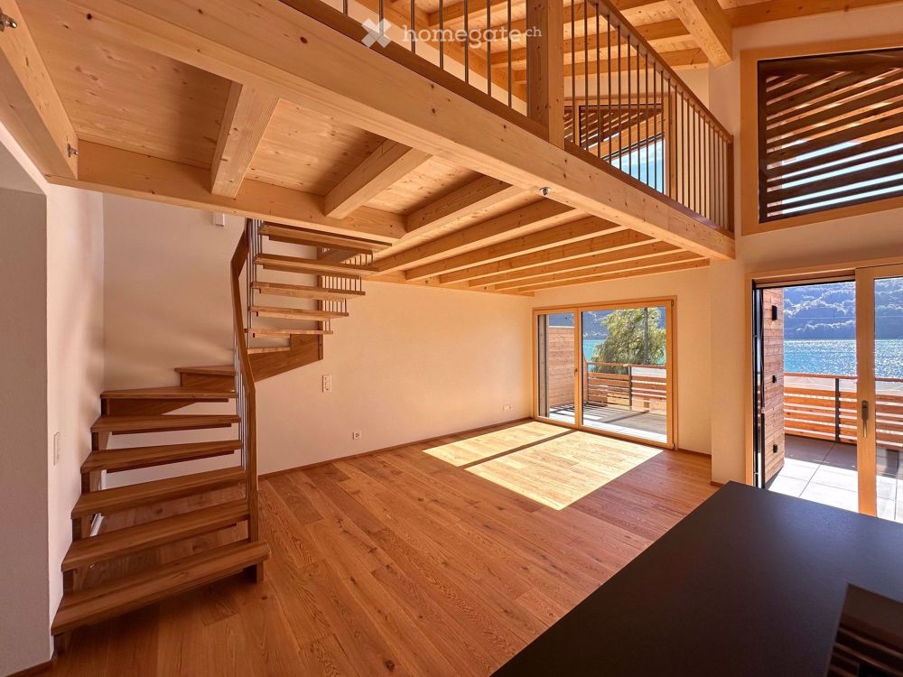 Exklusive Maisonette im Erstbezug – modernes Holzchalet mit Seepanorama und Loft-Charakter (WEST) - Bild 1