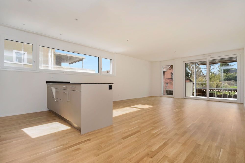 Traumhafte 3.5 Zimmer Erdgeschoss Wohnung im idyllischen Adlerweg - Wohnzimmer und Küche