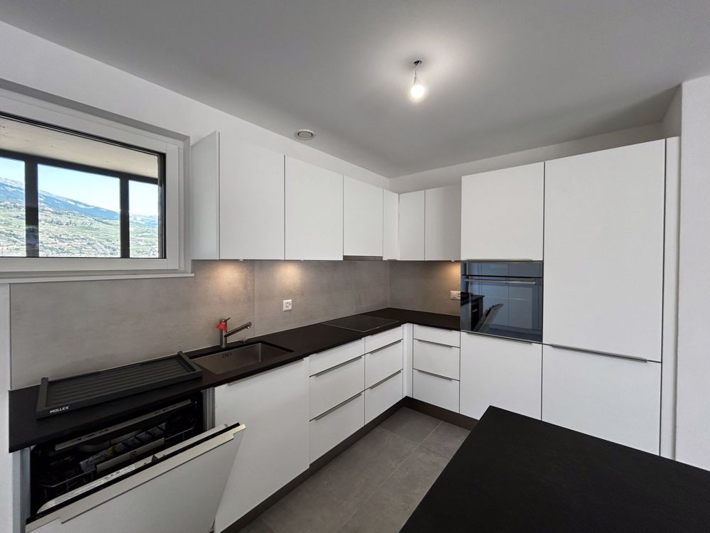 Dachgeschosswohnung mit 4.5 Zimmern in einem dynamischen Ökovieertel - Cuisine
