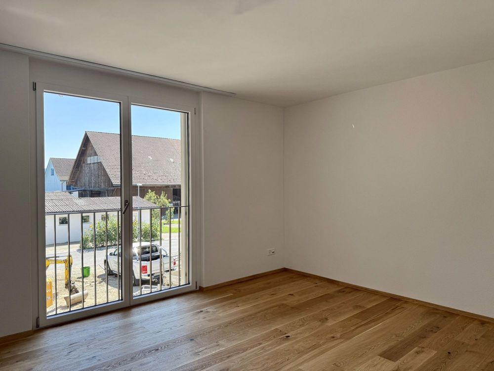 Moderne 4.5-Zimmer-Neubauwohnung mit Loggia - Erstvermietung - Zimmer 1