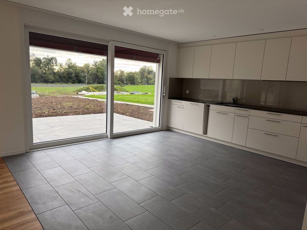 Erstvermietung einer modernen 4.5 - Zimmerwohnung im Erdgeschoss mit Gartensitzplatz - Bild 1