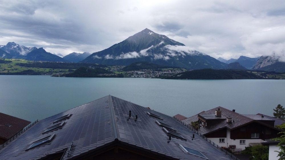 Neubau mit Traumaussichten auf See und Berge - Bild 1