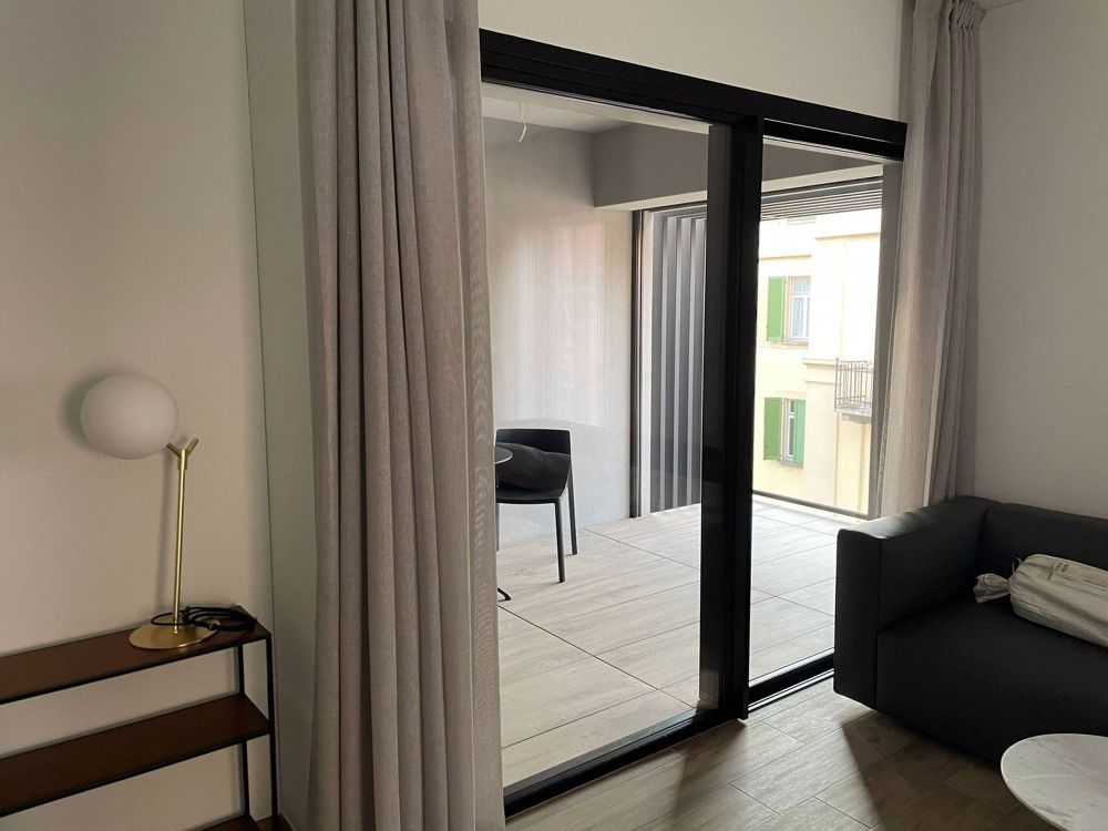Vivi il nuovo! Elegante Appartamento nel Cuore di Lugano - Bild 4
