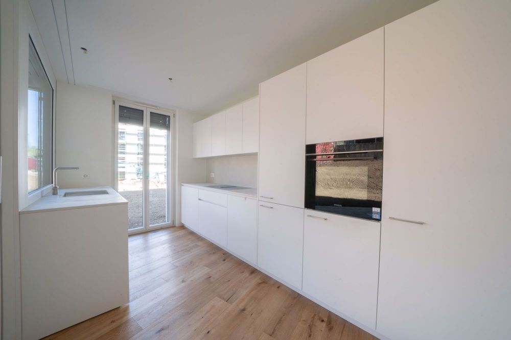 Erstbezug 3.5-Zimmer-Gartenwohnung mit ca. 138 m2 Rasenfläche - Bild 1
