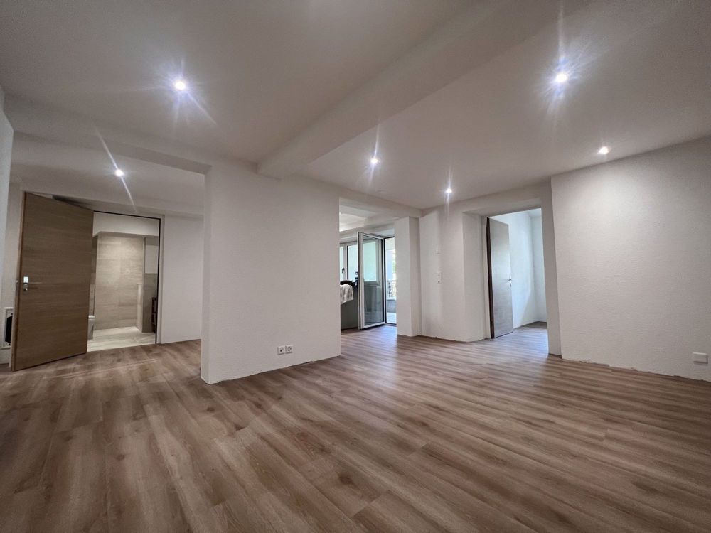 Exklusive Neubauwohnung mit stilvoller Designküche und unvergleichlichem Charme mitten in Arisdorf - Bild 1