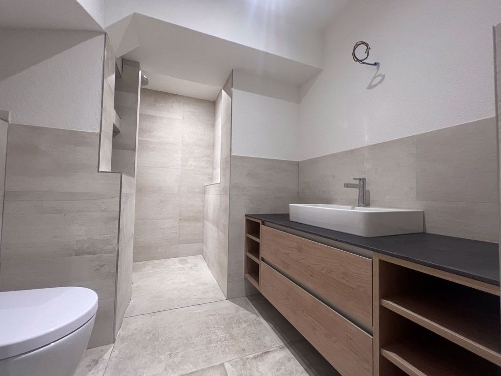 Exklusive Neubauwohnung mit stilvoller Designküche und unvergleichlichem Charme mitten in Arisdorf - Bild 13