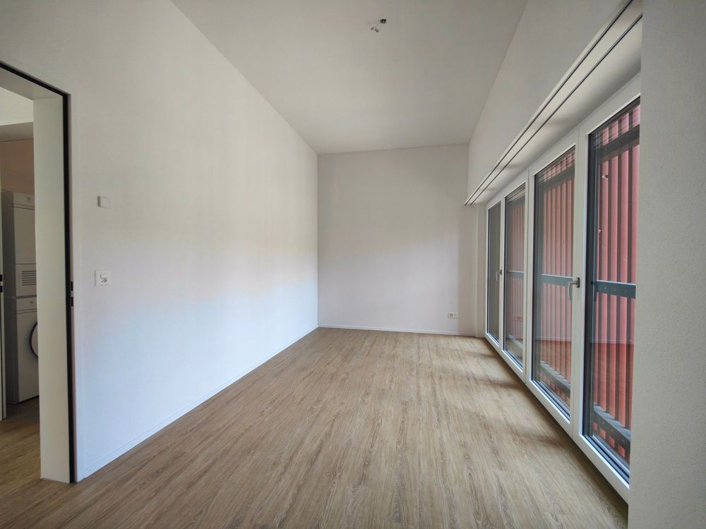 Stilvolle Neubauwohnung mit Gartensitzplatz im Herzen von Glattfelden - Schlafzimmer